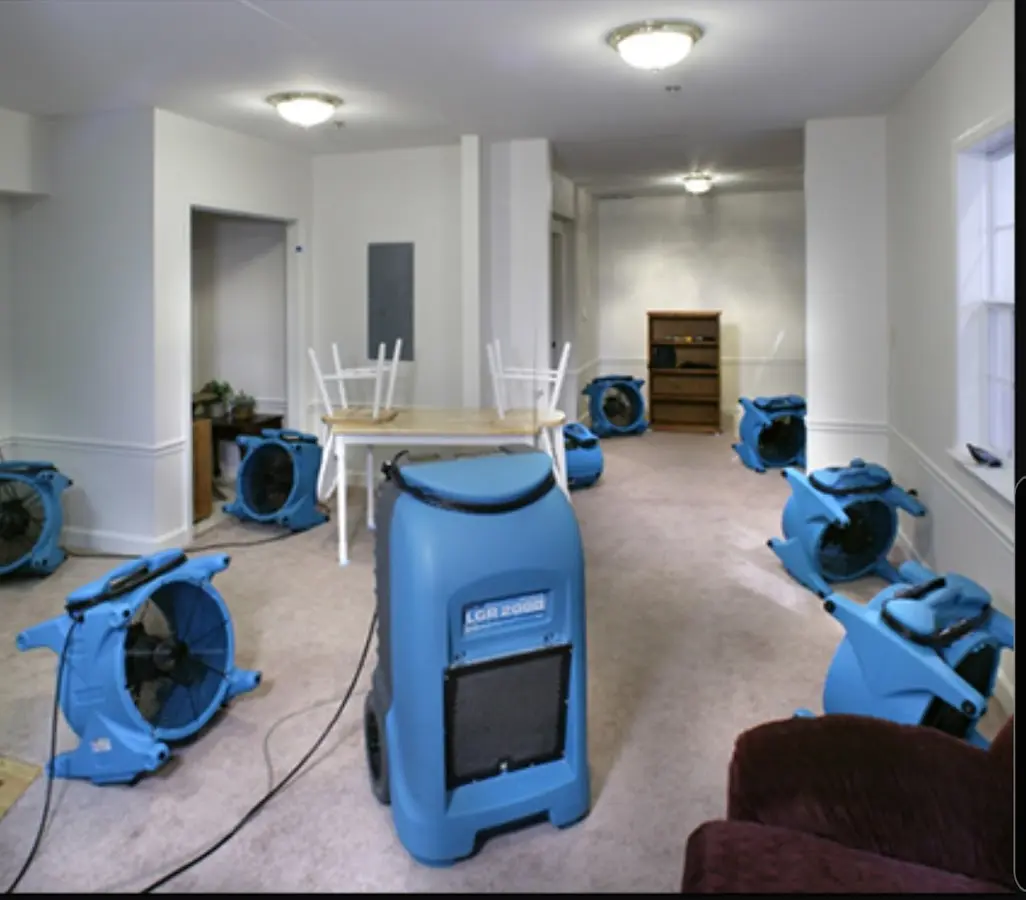 Air movers and dehumidifier setup for Water Damage Restoration in Green Oak